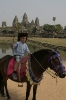 3_feb_2008__ld_on_pony_hat_and_whip_siem_reap_cambodia_angkor_wat_temple